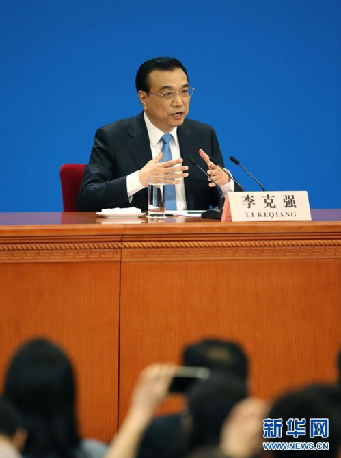 　3月15日，国务院总理李克强在北京人民大会堂与中外记者见面，并回答记者提问。 新华社记者 金立旺 摄